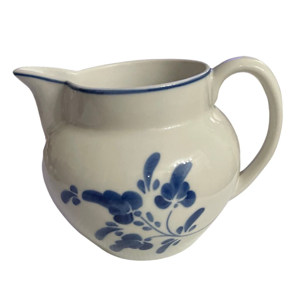 blue white pottery pitcher Viana do Castelo Portugal hand painted